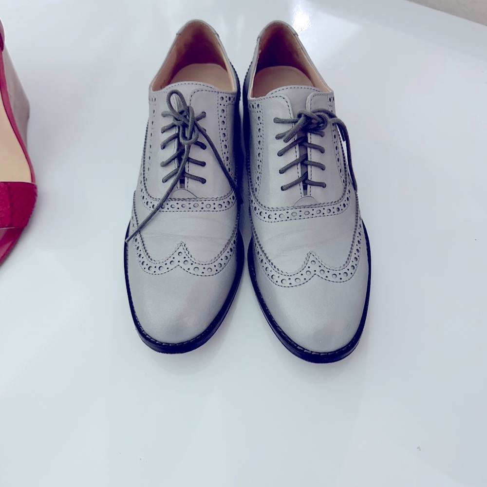 Cole Haan silver/grey wing tips. Ladies